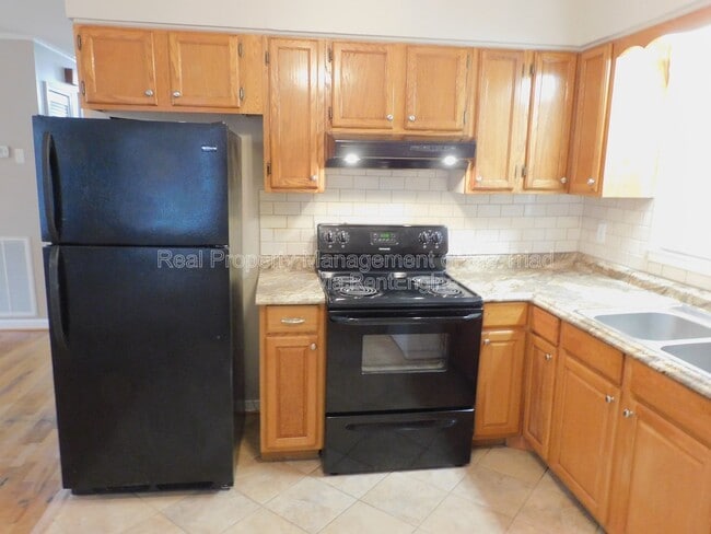 Building Photo - 3445 Huffine Mill Rd