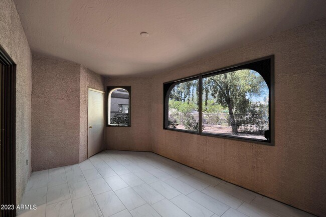 Building Photo - 9555 E Raintree Dr