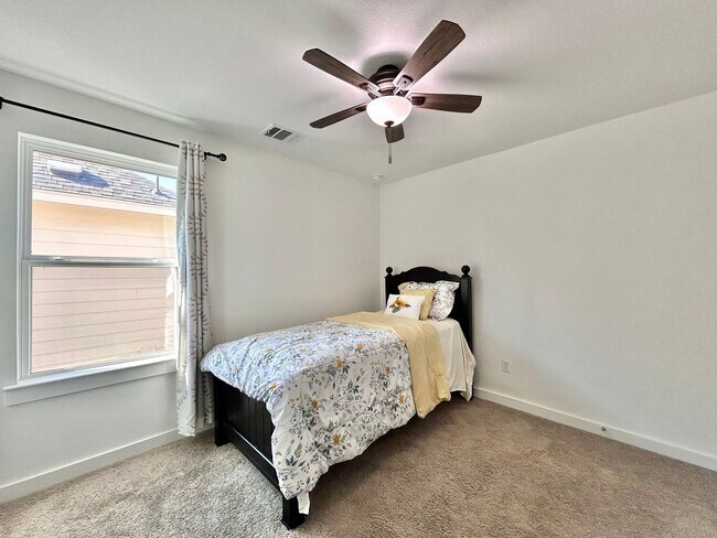 Building Photo - Inviting 4-Bed, 2.5-Bath Home with High Ceilings and Covered Deck