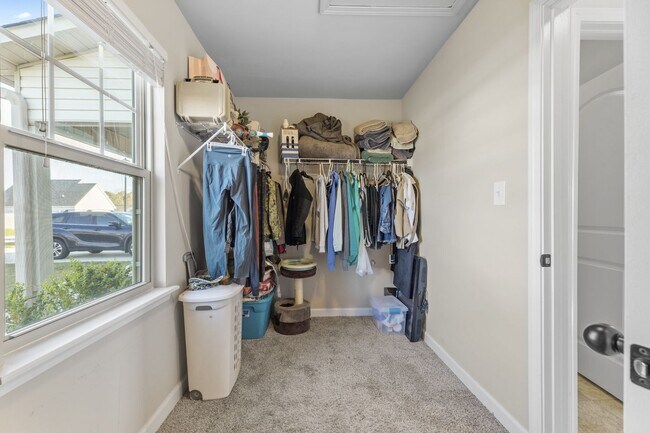 Building Photo - 3 Bedroom + Bonus Room Home with Main Floor Primary Suite & Community Pool Access