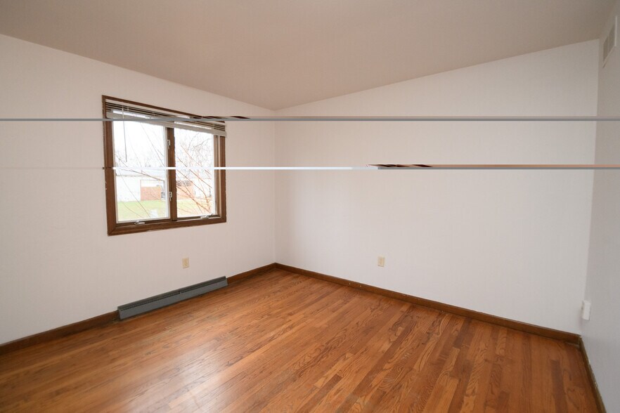 Building Photo - 2403 W 63rd Ave