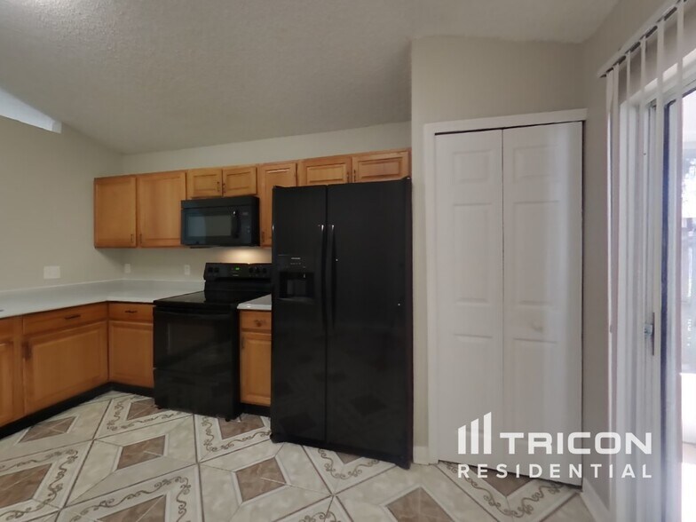 Building Photo - 7227 Lawn Tennis Ln