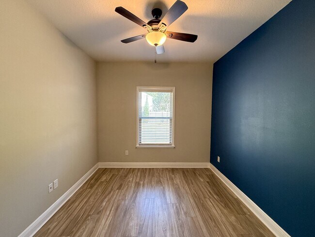 Building Photo - Spacious 3 Bedroom 2 Bath + Office with Split Floor Plan & Screened Patio in Pace!