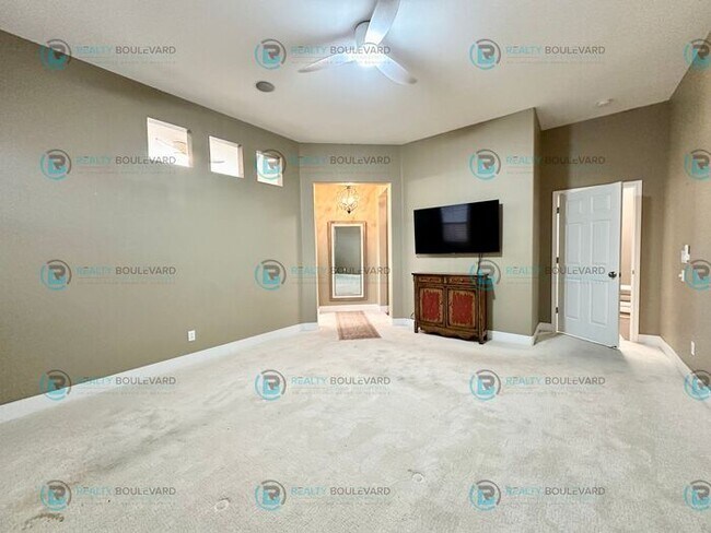 Building Photo - Open Kitchen, Expansive Living, and Covered Patio in Tranquil South Reno Near Trails, Parks & Sho...