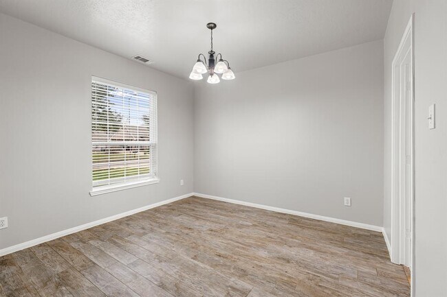 Building Photo - 6209 Fawnlake Dr