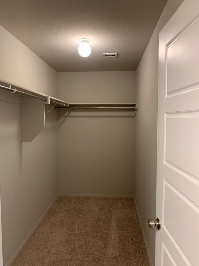 Building Photo - This well-designed 4-bedroom home has a split floor plan that gives the feeling of space.