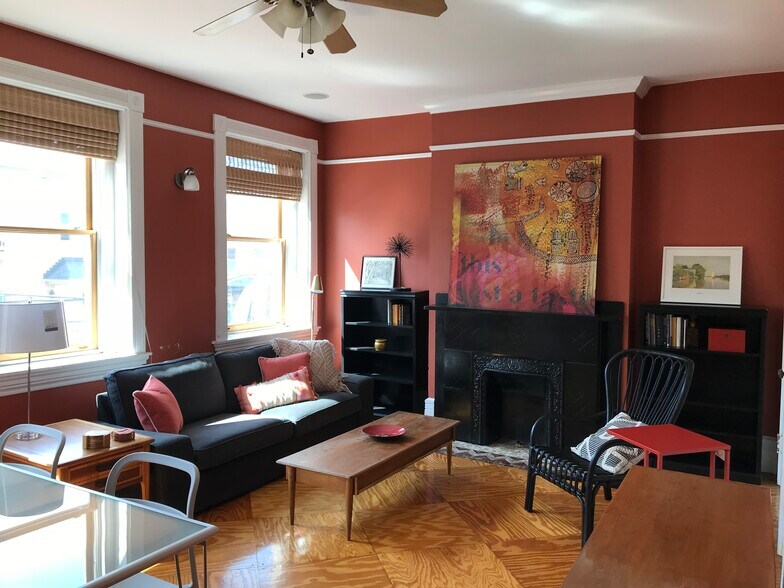 2nd floor living room (furnished). Dimensions (in U.S. feet): 13' x 16') Windows face west for afternoon light. - 3284 Dawson Street