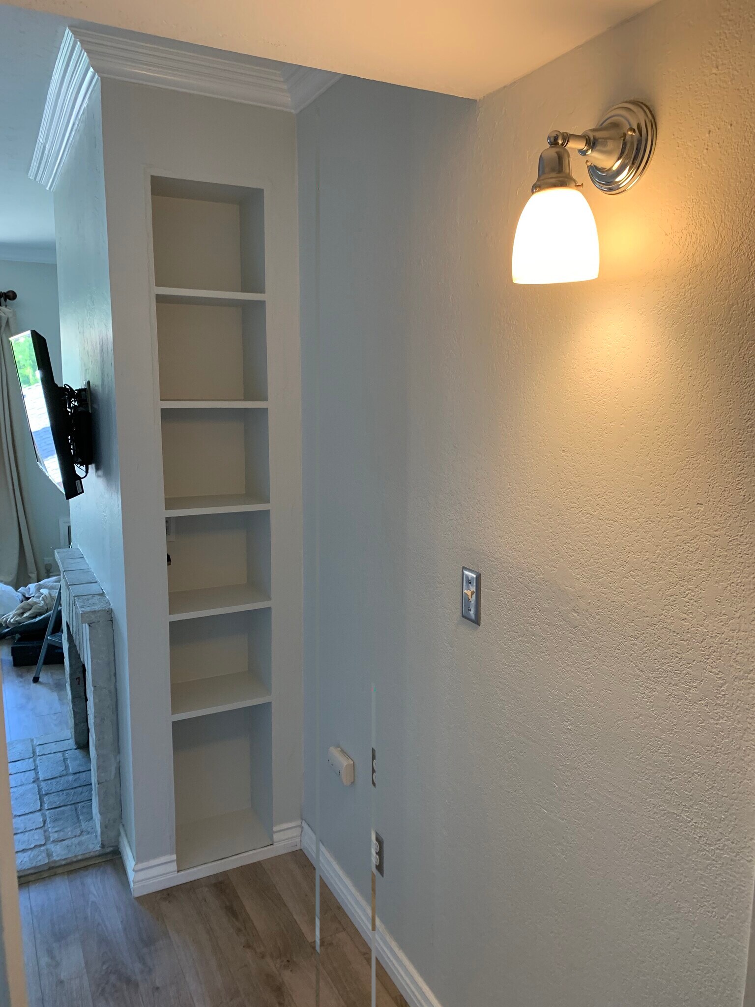Storage behind fireplace - 4062 Georgia St