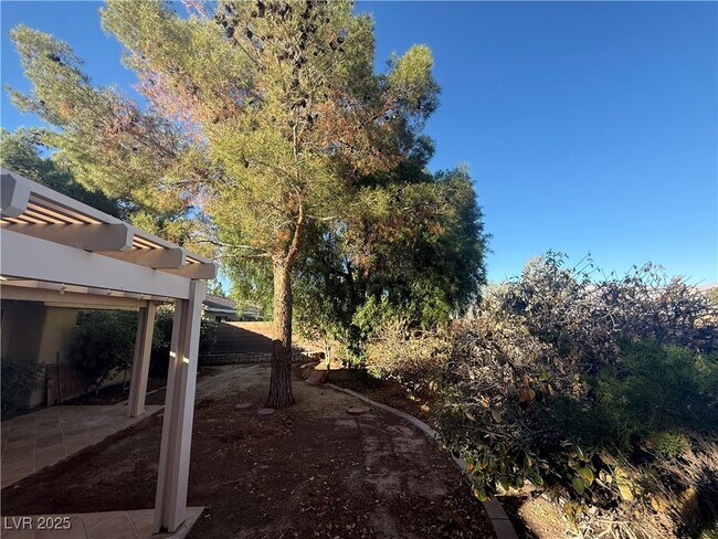 Building Photo - 8216 Romantic Sunset St