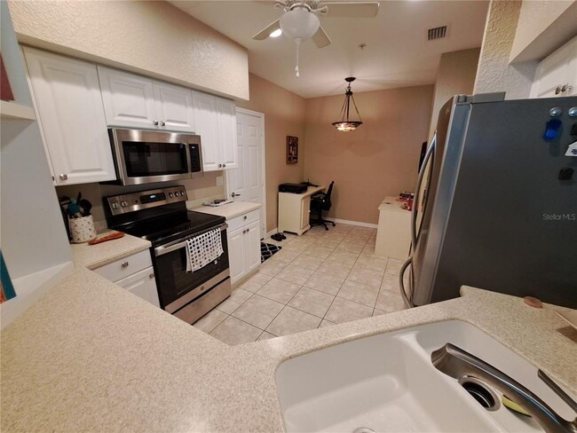 Building Photo - 7267 Fountain Palm Cir