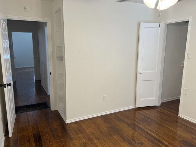 Building Photo - "Charming 4-Bed Lubbock Retreat: Granite Kitchen, Hardwood Elegance & Cozy Fireplace!"