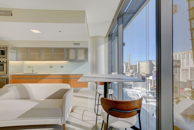 Building Photo - Stunning Strip Views from this Fully Furnished Studio Residence.