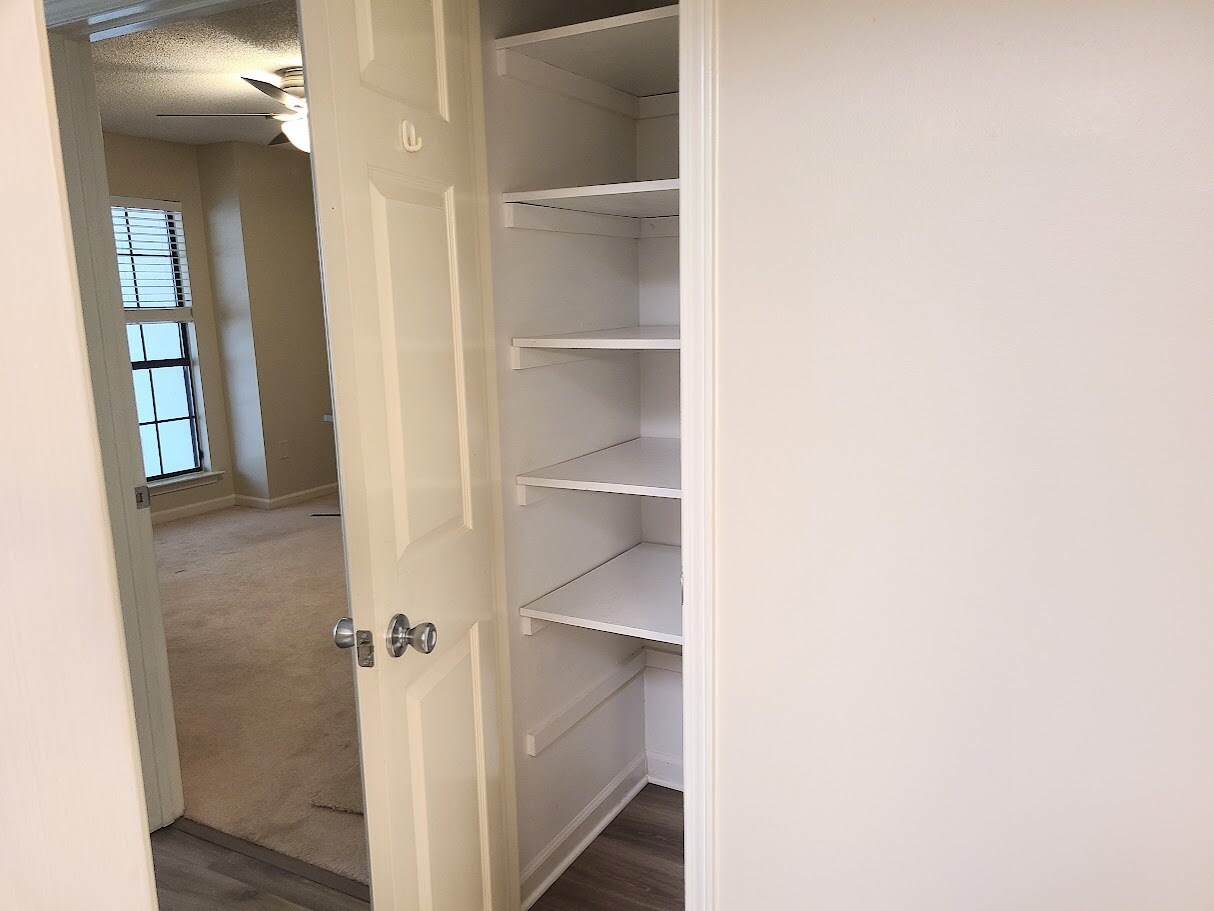 Convenient pantry in hall across from kitchen - 12439 Coursey Blvd