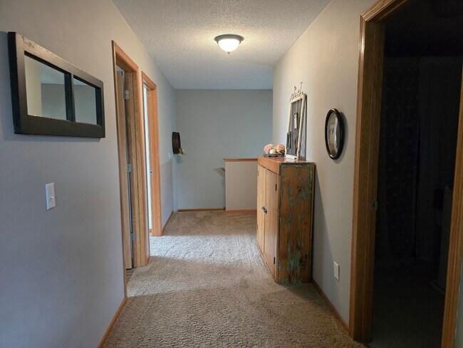 Building Photo - 9649 Peony Ln N