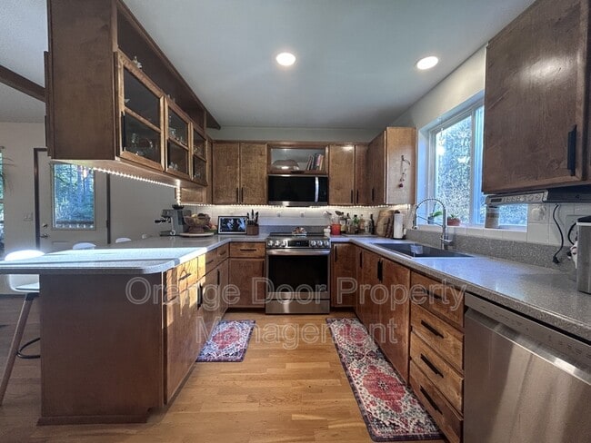 Building Photo - 9904 42nd St Ct NW