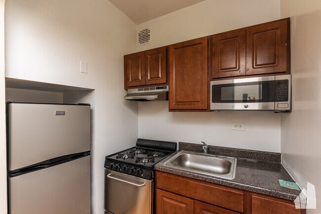 Building Photo - 948 W Cuyler Ave