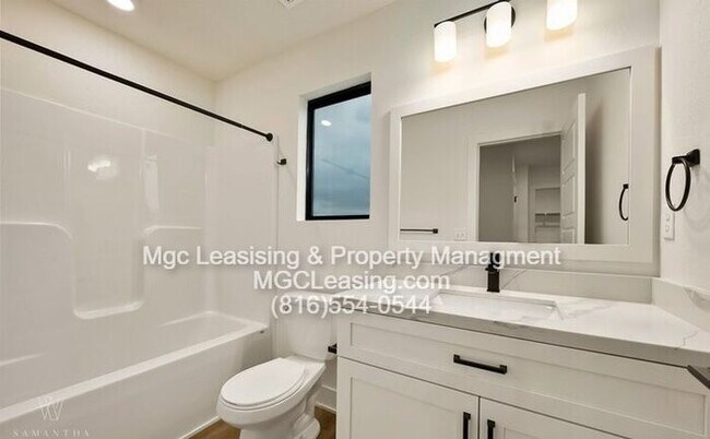 Building Photo - JULY MOVE IN SPECIAL-$750.00 OFF JULY RENT, Highly sought after Ayden Place Townhomes in Kansas C...