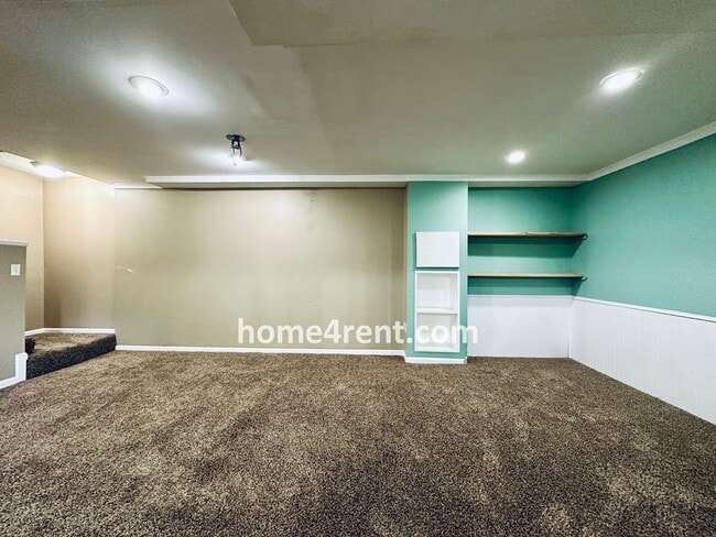 Building Photo - Blue Valley Schools w/ Wood Floors, Finished Basement and a Peaceful, Private Fenced Yard!