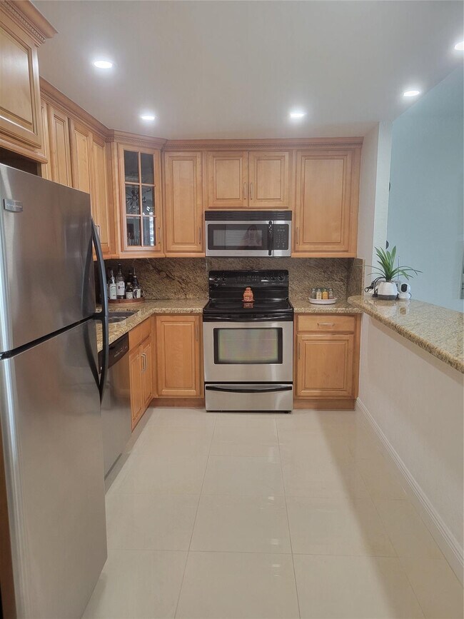 Building Photo - 19370 Collins Ave