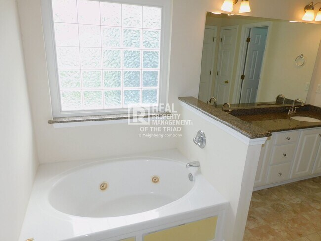 Building Photo - *NW High School* Lovely 4BR/2.5BA Home off...