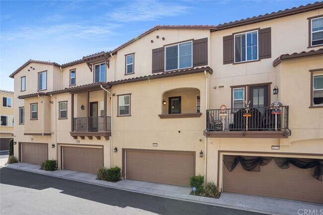 Building Photo - Modern Tri-Level Townhome with Office, 2-Car Garage & Prime Anaheim Location!