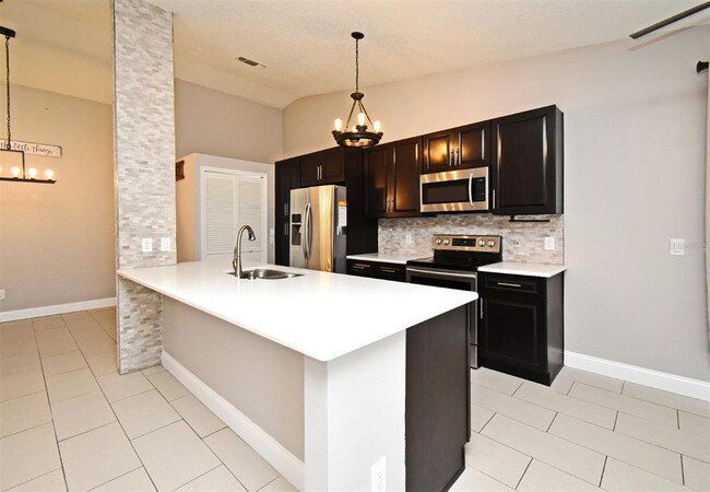 Building Photo - 1242 Ravida Woods Dr
