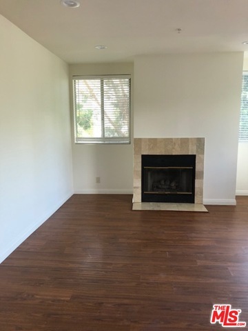 living room with fireplace. - 120 S Crescent Dr