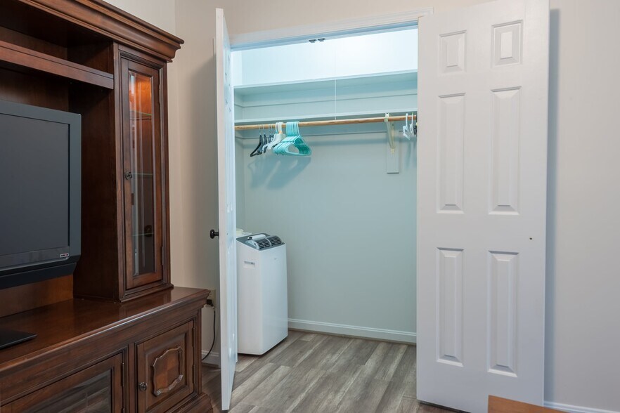 Closet in living room - 202 Chinaberry Dr