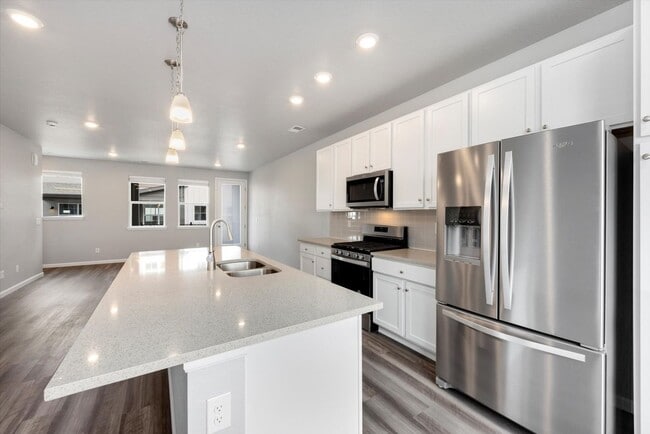 Building Photo - Gorgeous NEW Three Story Townhome with two car attached garage!