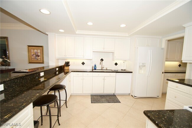 Building Photo - 6075 Pelican Bay Blvd
