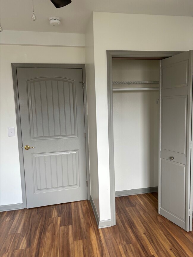 Rear bedroom closet and door to living room - 135 W Miller Ave