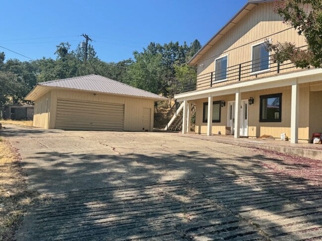 Building Photo - PRIVATE ONE OF KIND THAT SITS ATOP A HILLSIDE W/ VIEWS