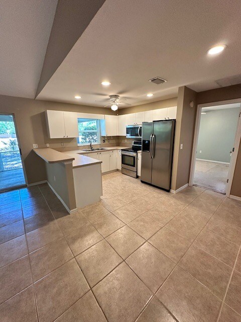 Building Photo - 4675 Breezy Pines Blvd