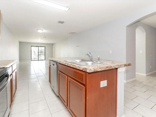 Building Photo - 5555 Maggiore Blvd