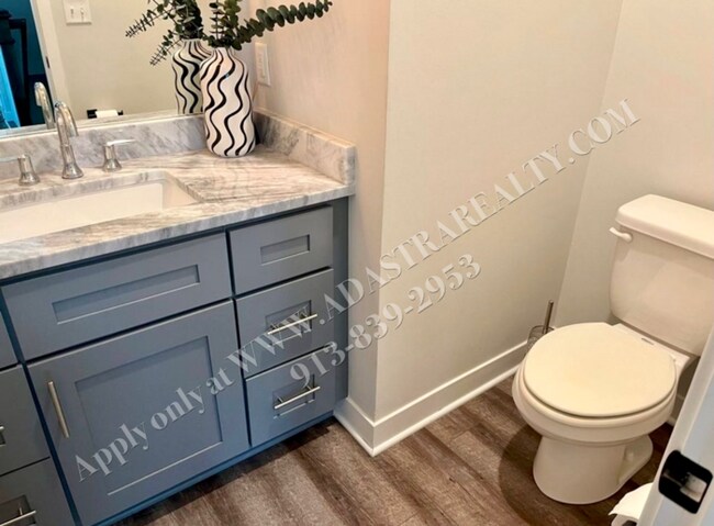 Building Photo - Spacious 4-Bedroom Townhome with Finished Basement in Blue Valley School District-Available NOW!!