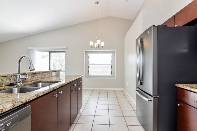 Building Photo - 10827 Peppersong Dr