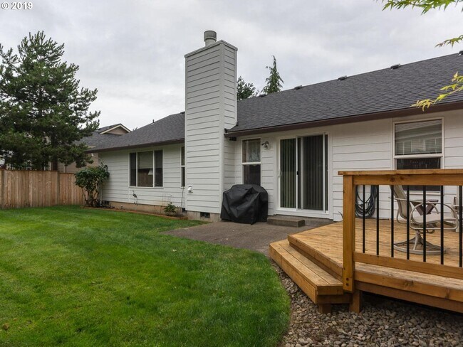Building Photo - Charming 4-Bed, 2-Bath Home with Vaulted Ceilings, Dual Fireplaces & Serene Outdoor Spaces