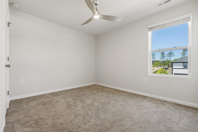 Building Photo - Move-In Ready 4BR Home | Deck, Patio & Open Concept Living