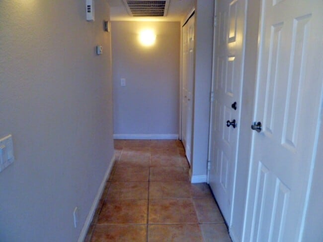 Building Photo - Palm Lake Villas Condo #130