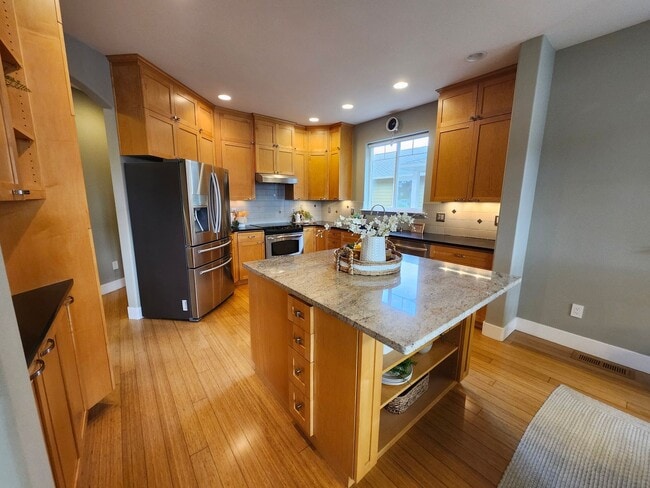 Building Photo - 2 Primary Suites, Beautiful Office & Theater Room! Experience Unmatched Luxury on the Columbia Ri...