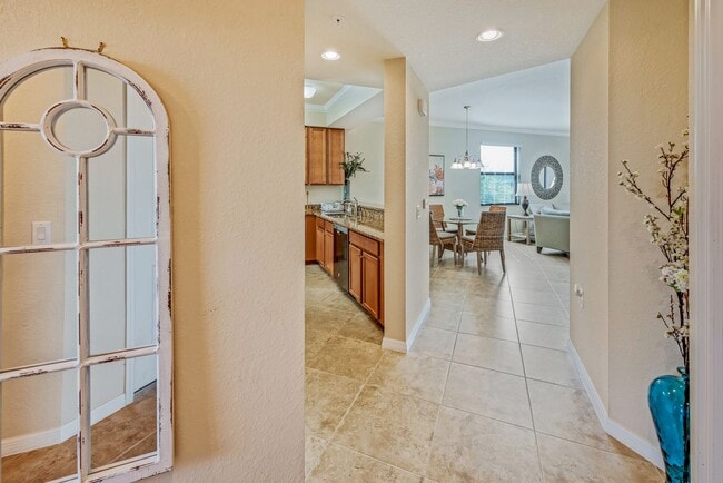 Building Photo - Available from Jun 1st as a furnished annual 2BR/2BA+Den Condo in Treviso Bay!