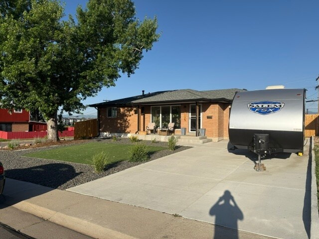 Front of house with travel trailer. - 7101 Clay St