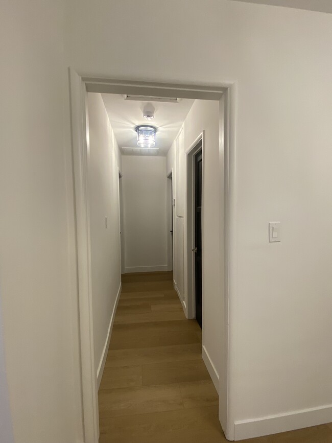 Hallway to bath and bedrooms - 17633 Lemay St