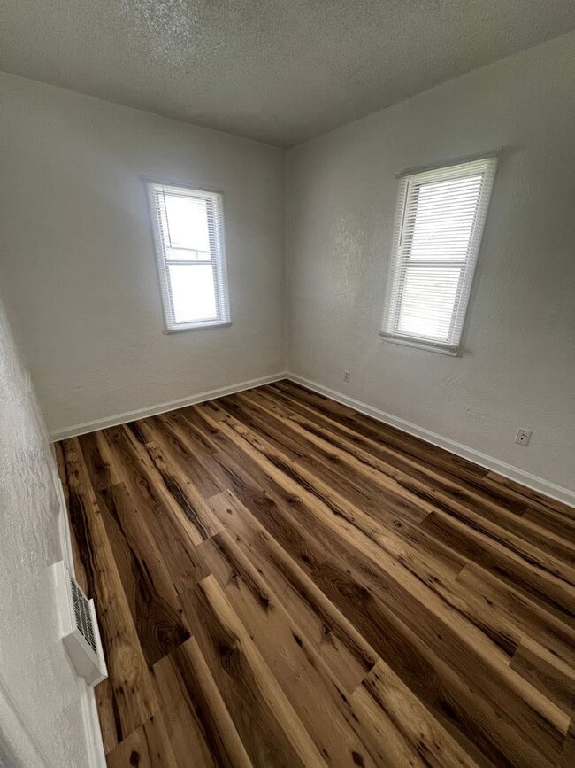 Building Photo - Updated 4-Bedroom 1.5 Bathroom Home with Fenced Yard