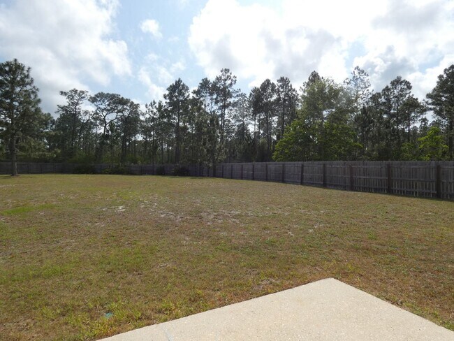 Building Photo - Spacious 3-Bedroom Home - Half Acre Lot