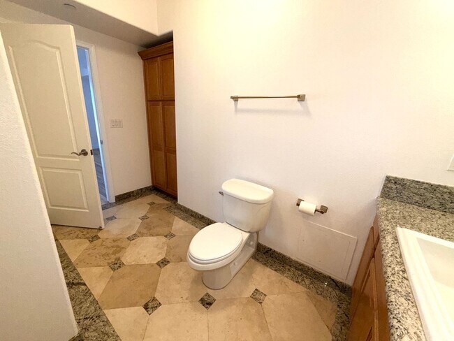 Building Photo - Riverwalk Tower 2 Bedroom Condo - 2 Parking Spaces/Private Laundry