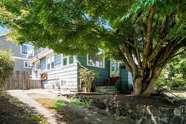 Building Photo - Spacious 4-Bedroom Seattle Home with Bonus...