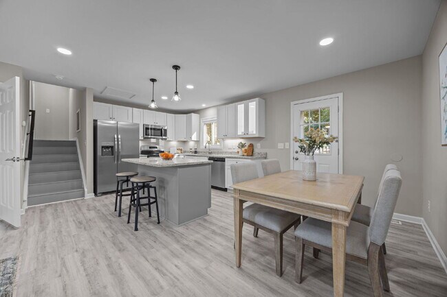 Building Photo - Charming 3-Bed Home with Granite Touches & Finished Basement in Raleigh!