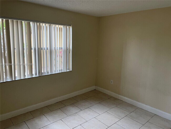 Building Photo - 4235 N University Dr