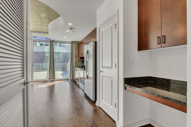 Building Photo - Stunning condo in the heart of SoBro at the Encore! Beautiful 1 bed, 1 bath on the amenity floor ...